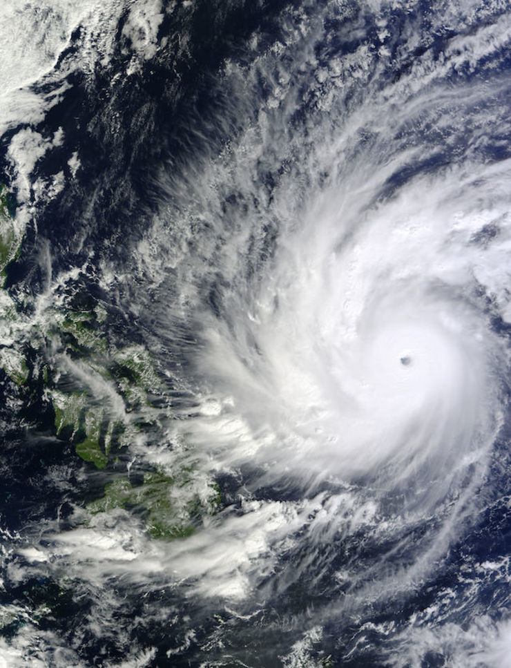 MONSTER STORM. On December 4, 2014, at 02:10 UTC, the MODIS instrument aboard NASA's Terra satellite took this visible image of Super Typhoon Hagupit approaching the Philippines. Image Credit: NASA Goddard's MODIS Rapid Response Team